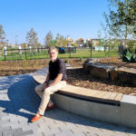 Maglin president and CEO Ian McAskile sits on an Ogden Bench in Yorkville Central Park, Calgary
