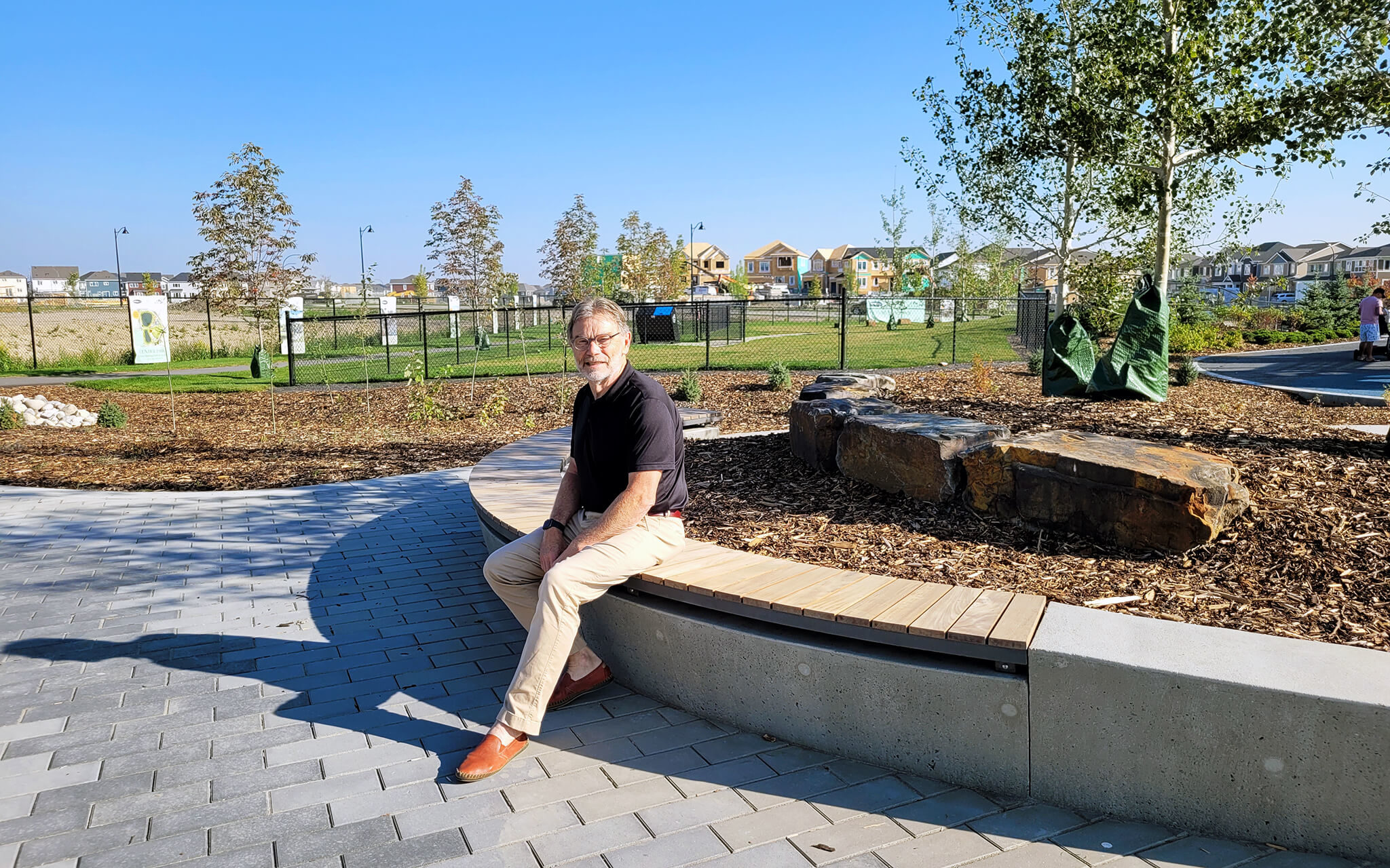 ian-ogden-calgary-about Maglin president and CEO Ian McAskile sits on an Ogden Bench in Yorkville Central Park, Calgary