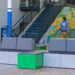 Students walking through corridor at UNC Charlotte with Pixel modular seating