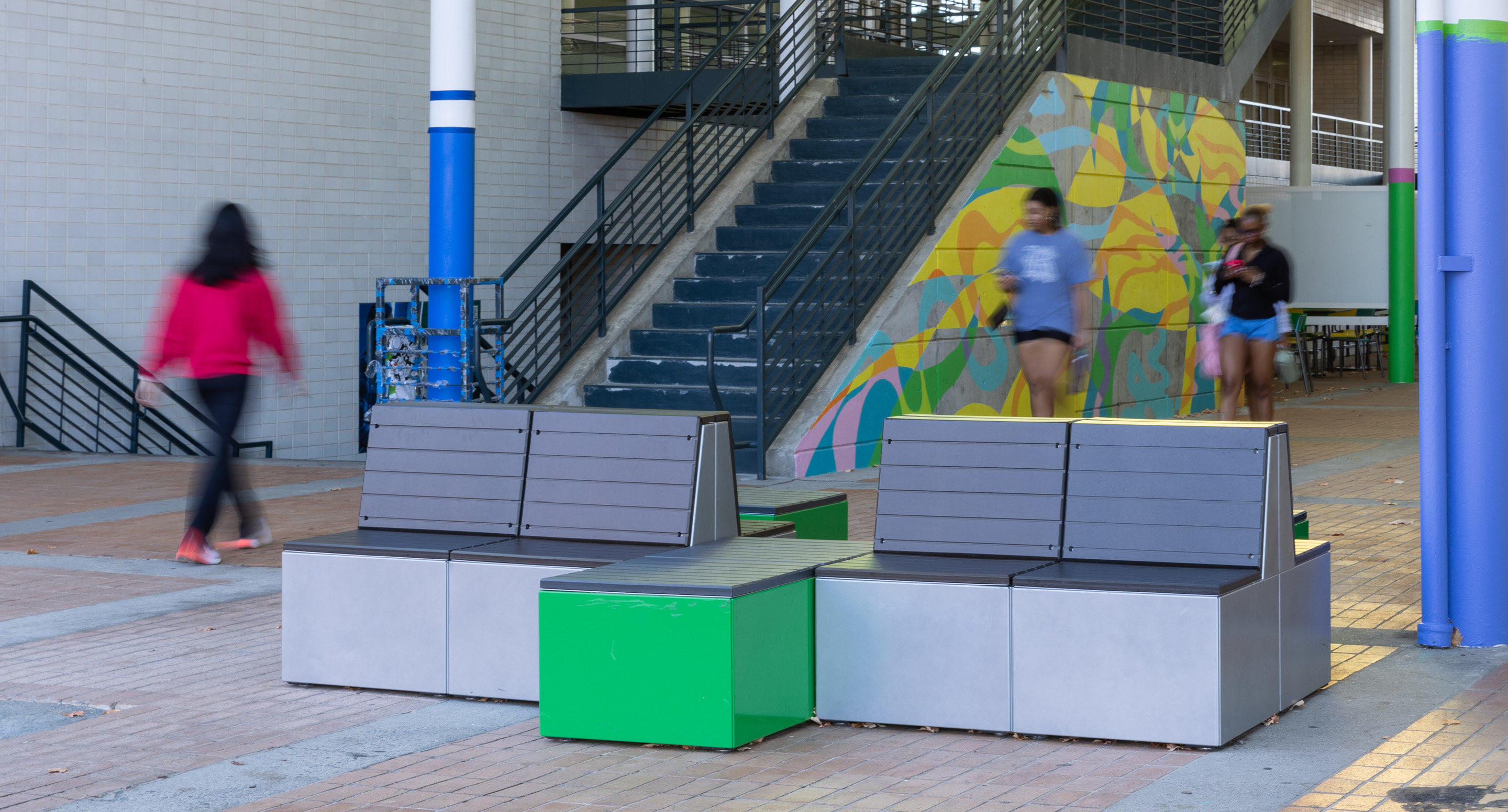 Students walking through corridor at UNC Charlotte with Pixel modular seating