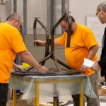 Maglin employees Steve, Rodney, and Mike assemble Fava Cluster Seating at the Maglin warehouse.