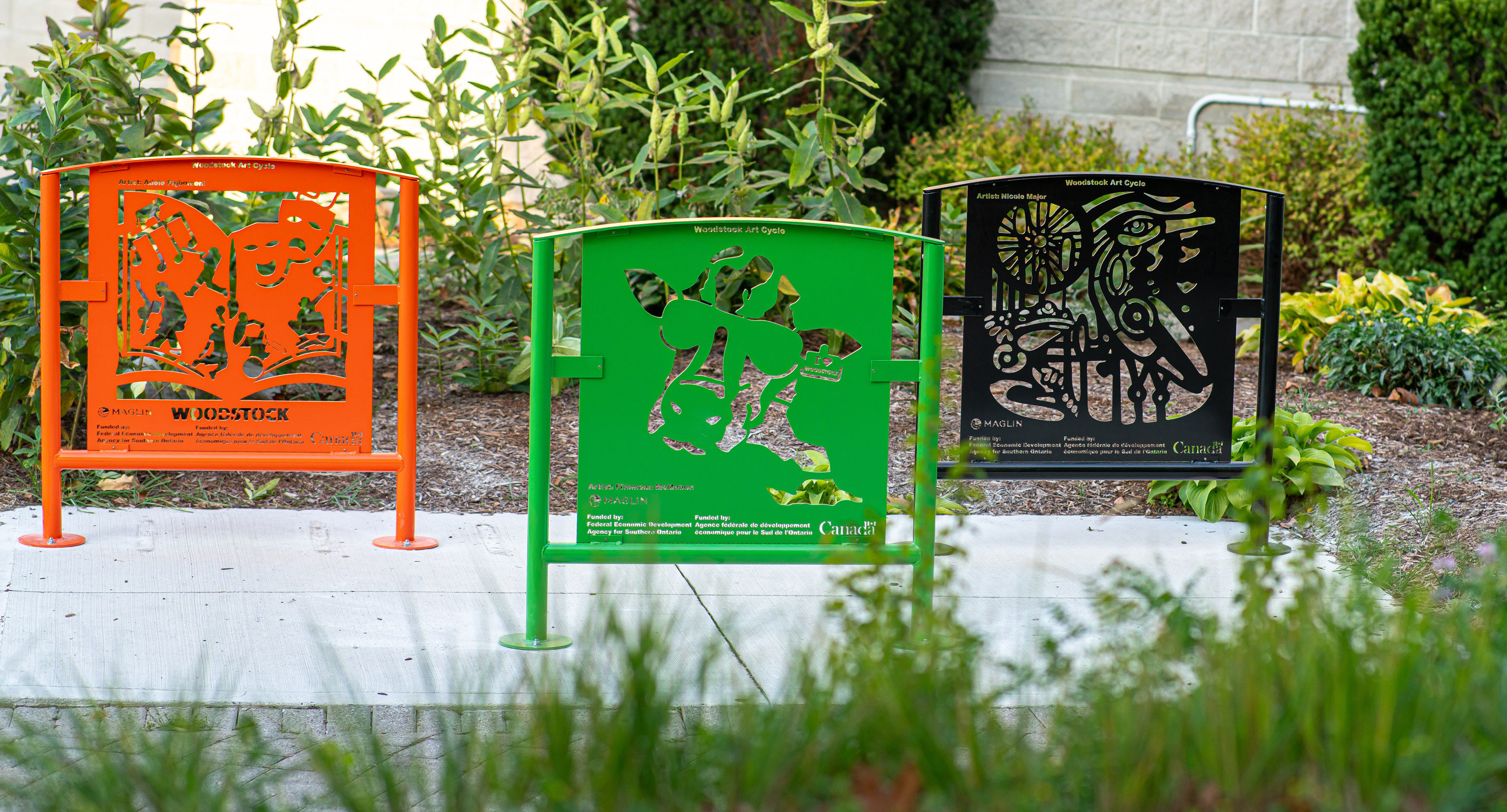 Custom artwork bike racks in bright colors