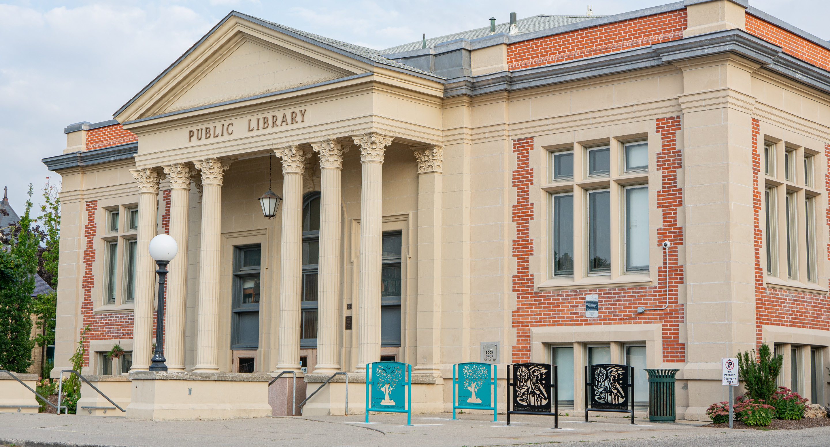 City of Woodstock library with custom artwork bike racks in front