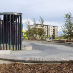 Ogden backless curved benches wall-mounted with art wall