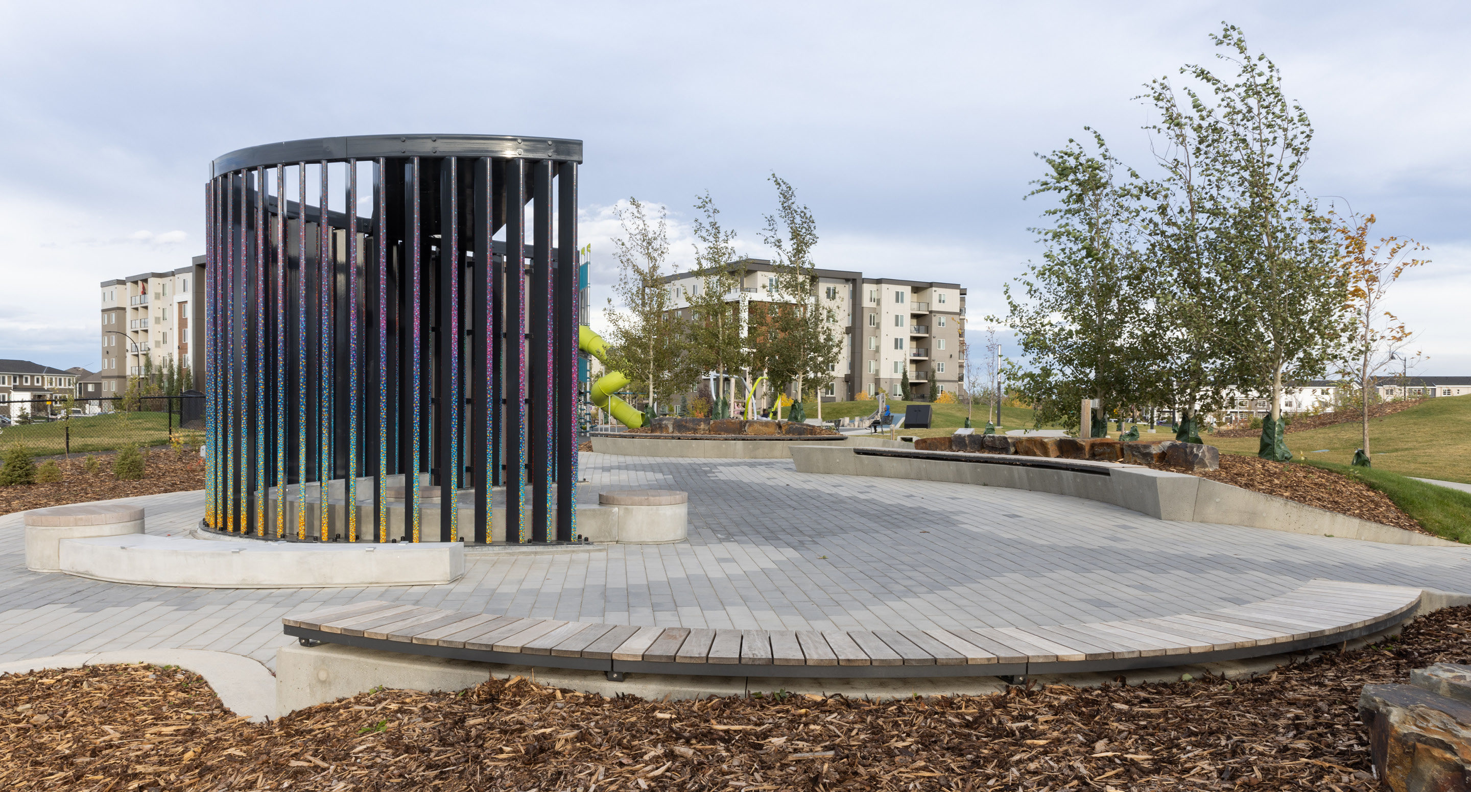 Ogden backless curved benches wall-mounted with art wall