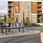 720 tables and benches in park with wood beams and building
