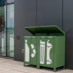 Three green outdoor bins labeled